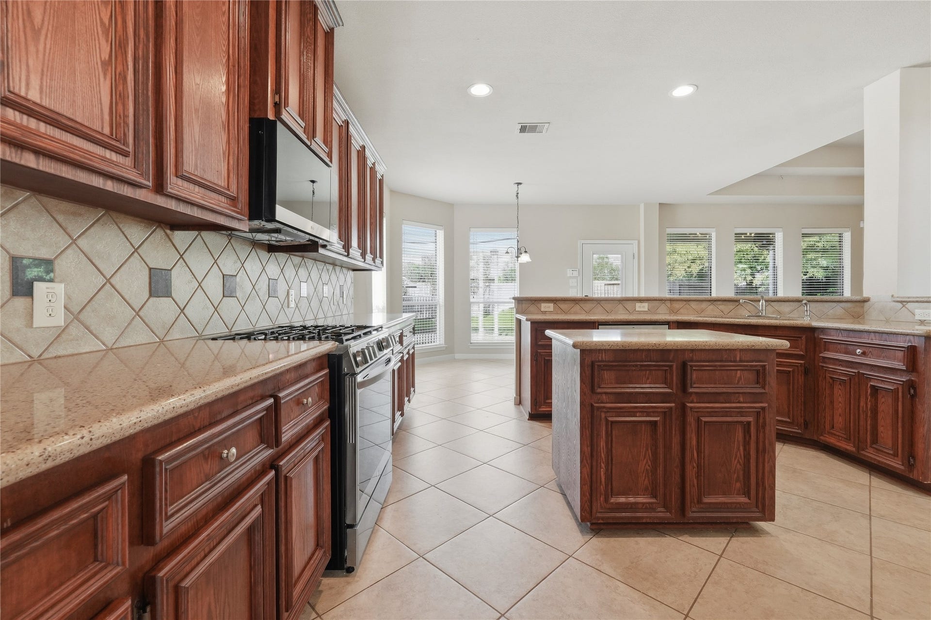 907 Colorado Springs Court, Spring, TX 77373 The island provides a great workspace and extra storage.