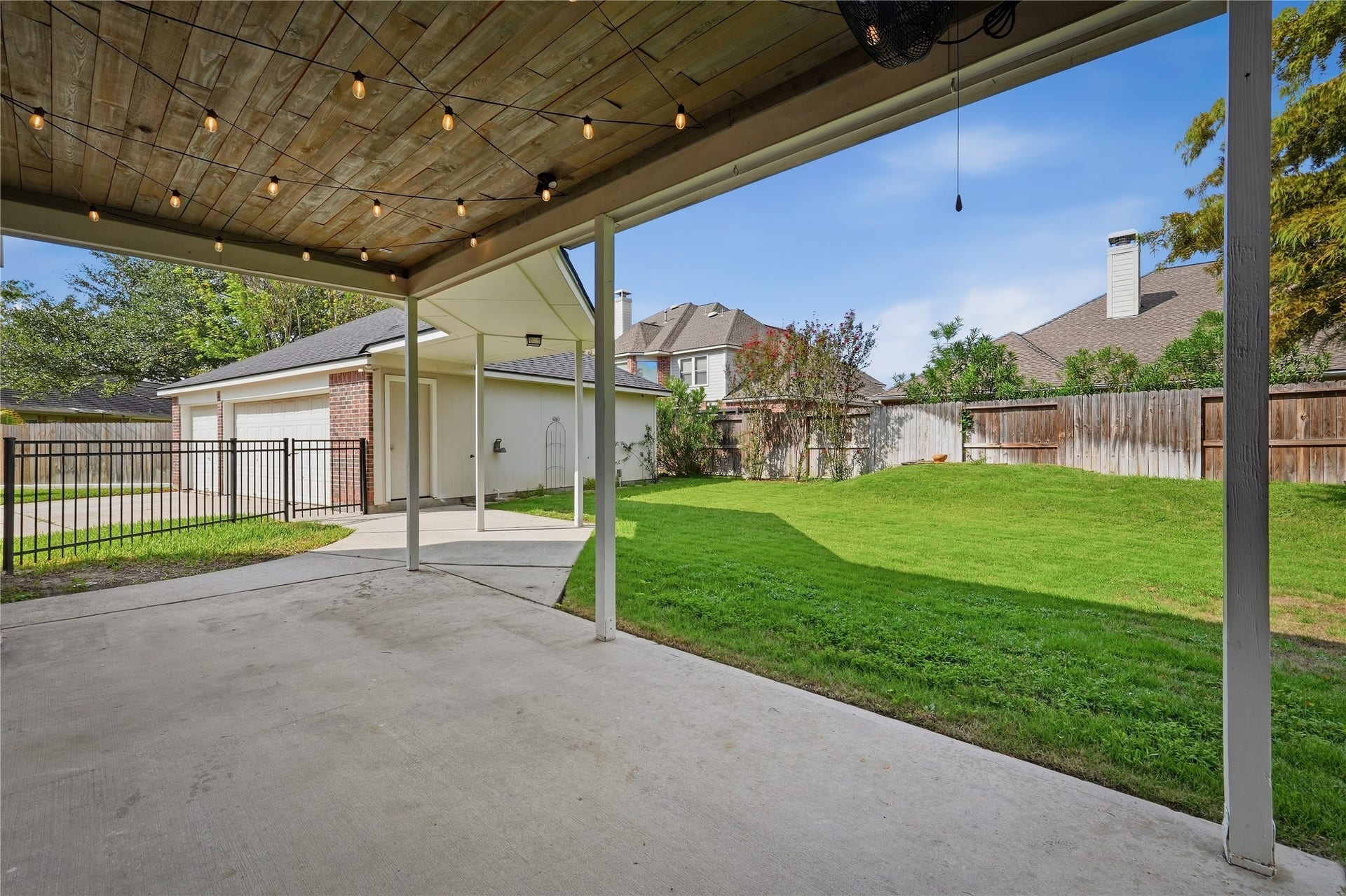 907 Colorado Springs Court, Spring, TX 77373 Great patio with wood slated ceiling.