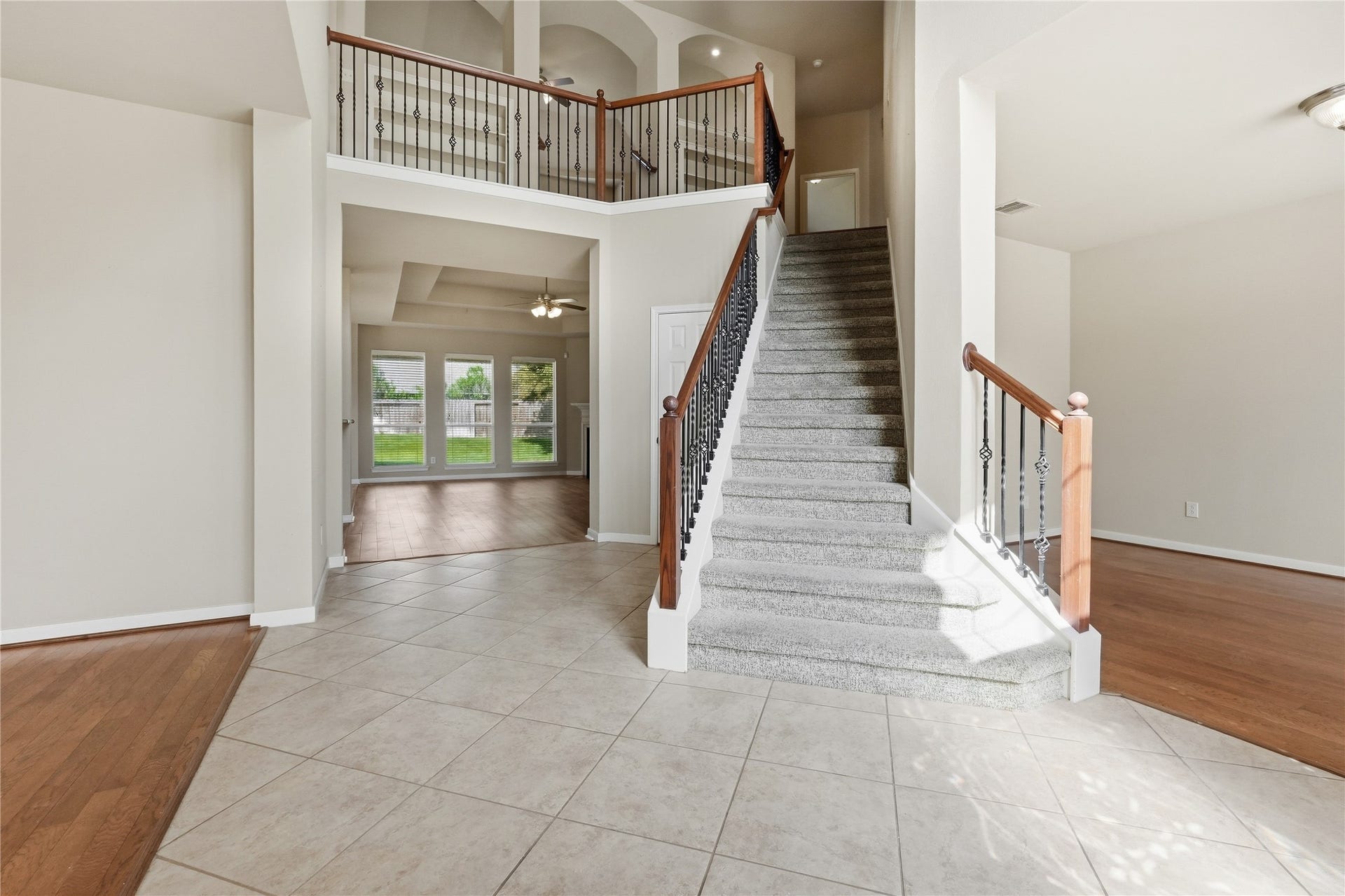 907 Colorado Springs Court, Spring, TX 77373 From your entry you can see some of the architectural details in the living room ceiling as well as at the top of the stairs.