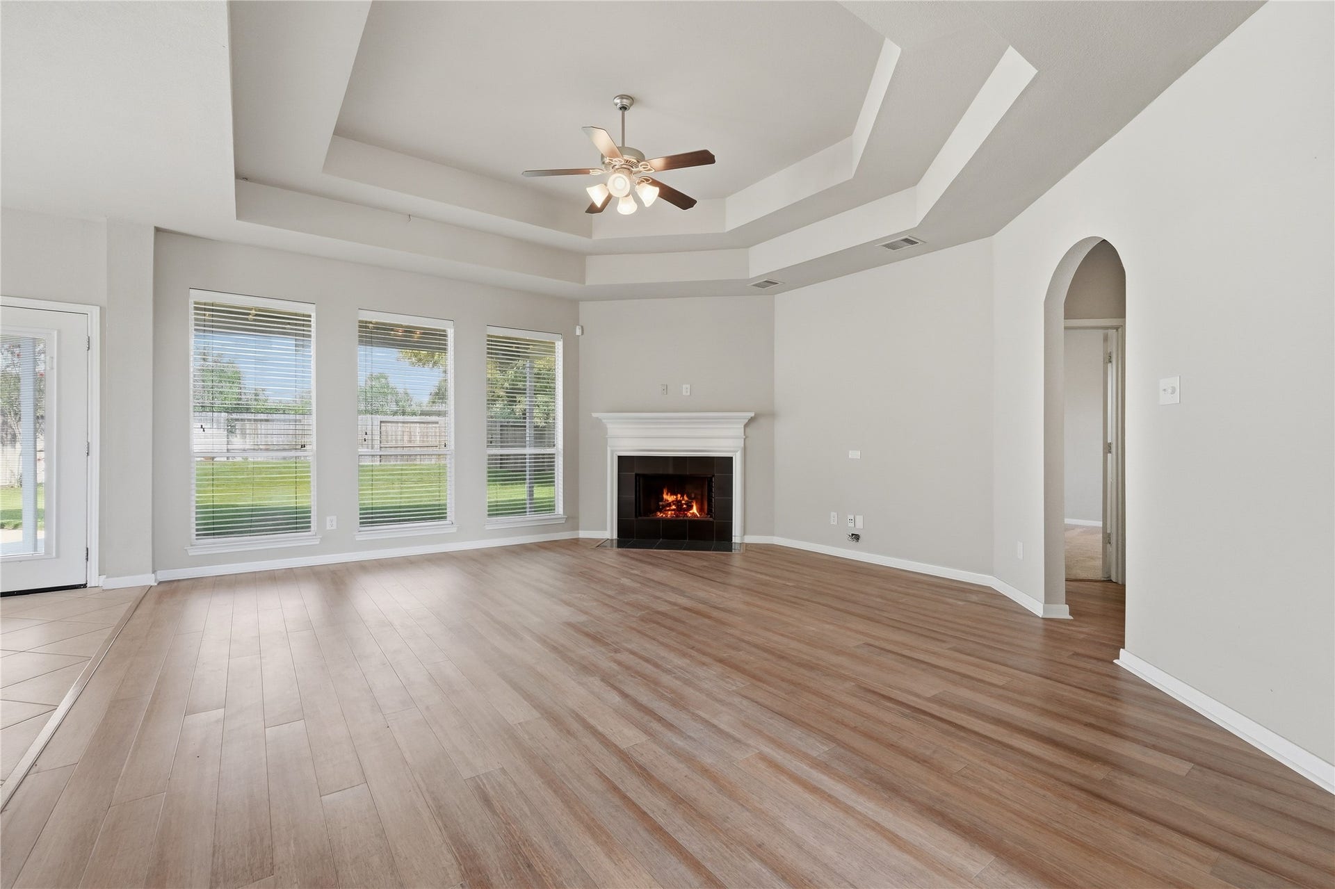 907 Colorado Springs Court, Spring, TX 77373 The living room is bright and open to the kitchen.