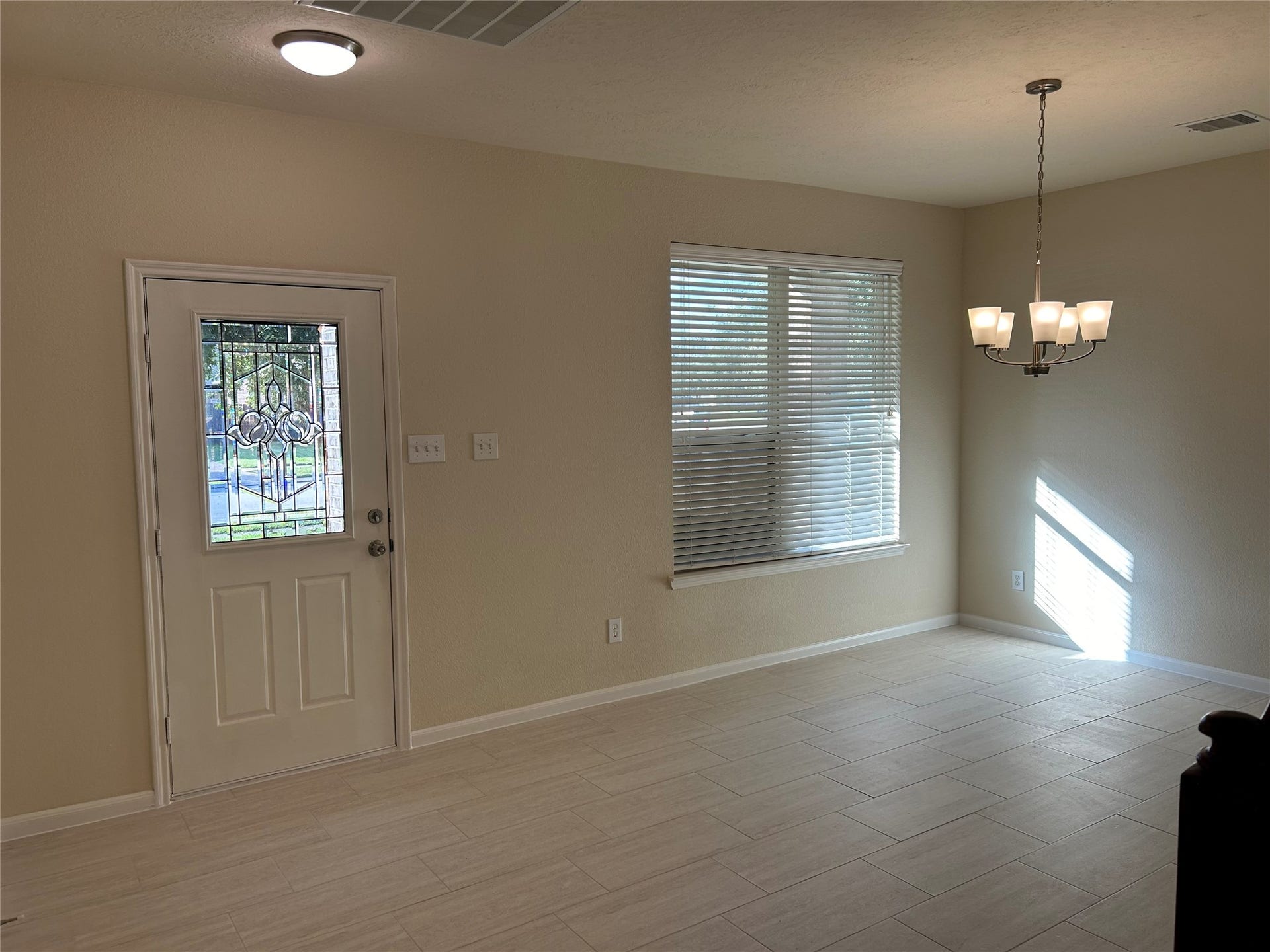 106 Easton Glen Lane, Dickinson, TX 77539 Entry to the home you are greeted by a fabulous dining area.