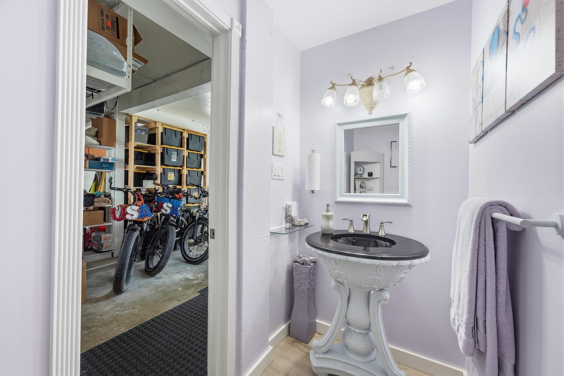 Conveniently located full bath with a shower offers easy access from the pool and outdoor living areas, making it especially practical for days spent outside.