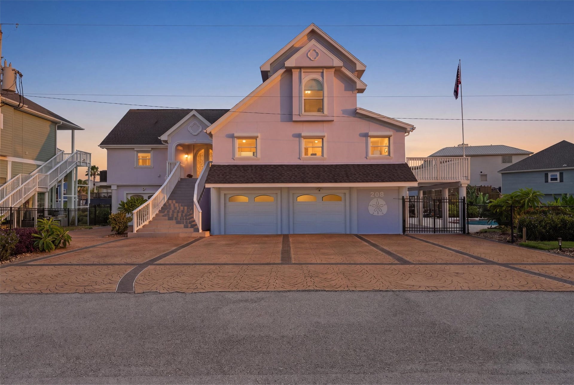 Welcome to 208 Coconut Street, offering waterfront living on an oversized double lot in Tiki Island.