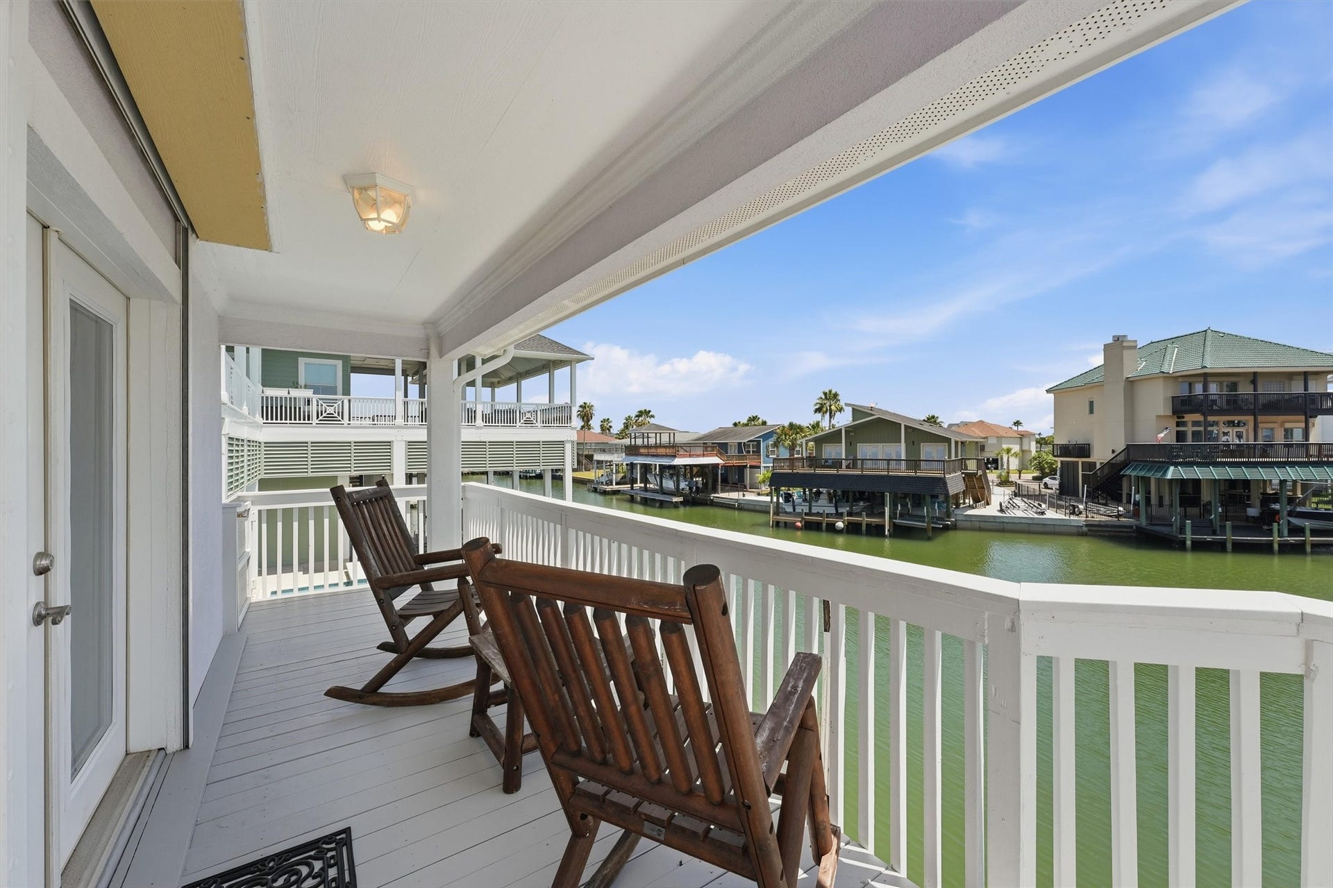 Located off the guest suite, this balcony complements the suites separate entrance, giving guests their own space to come and go without disturbing the main house.