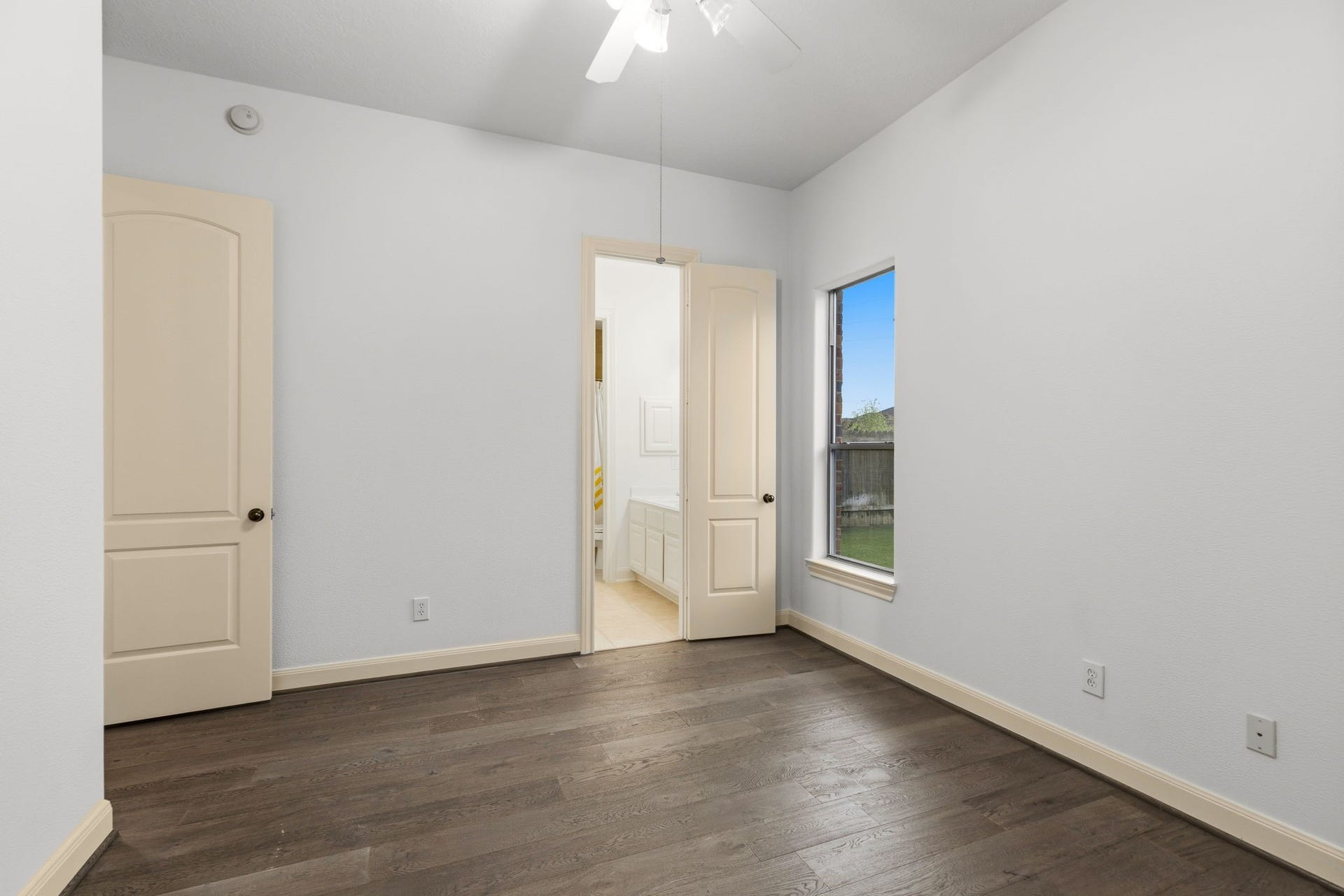 Another downstairs bedroom connected to the Jack & Jill bathroom that is shared by the mother in law suite.