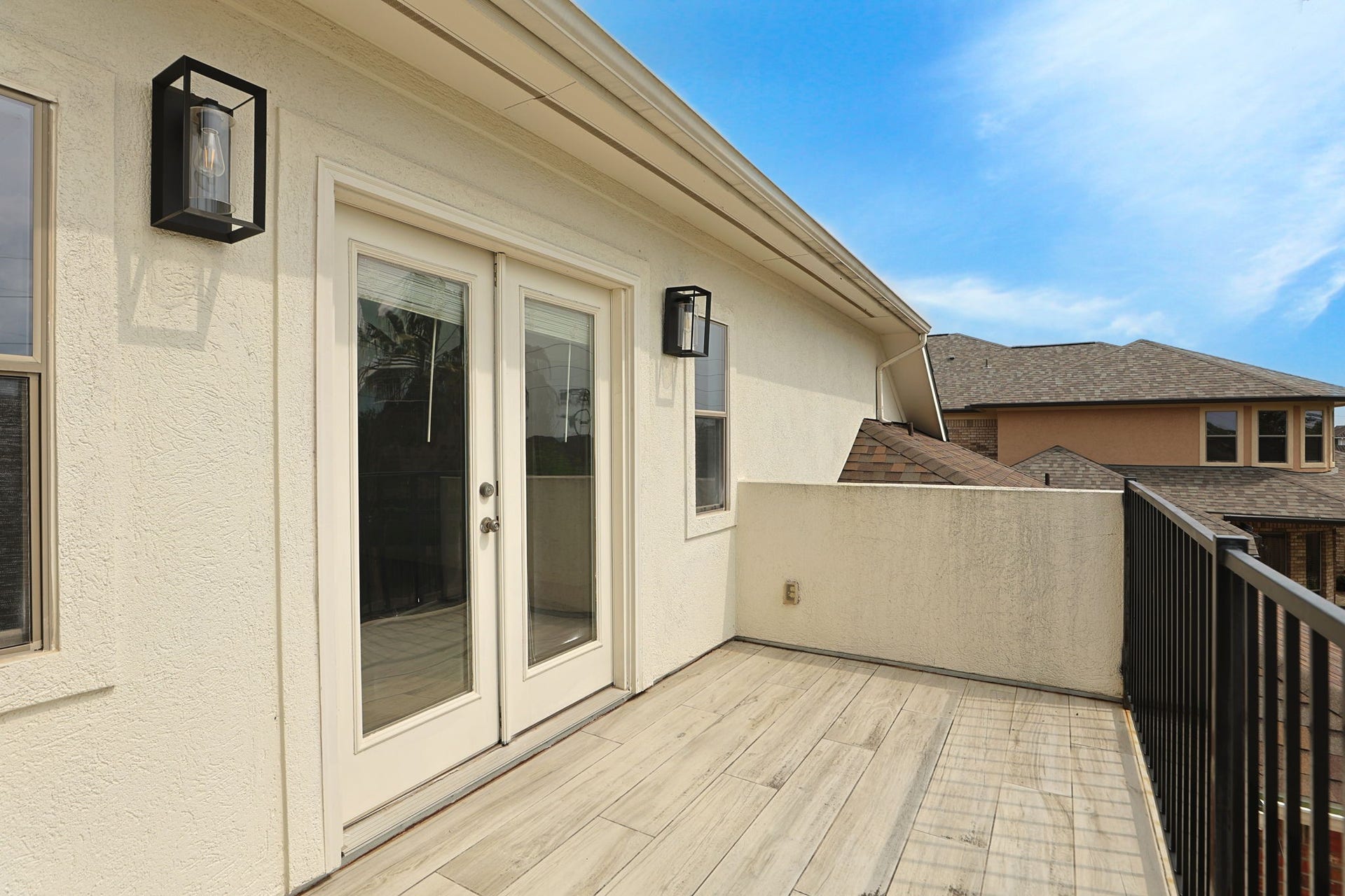 Balcony off the upstairs game room over looking the pool.