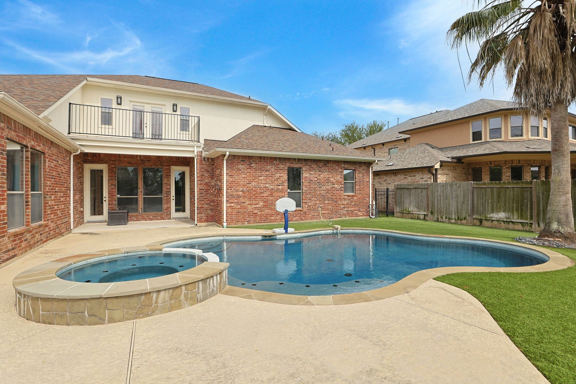This home has it all pool, hot tub and a basketball court.  You never have to leave!!!