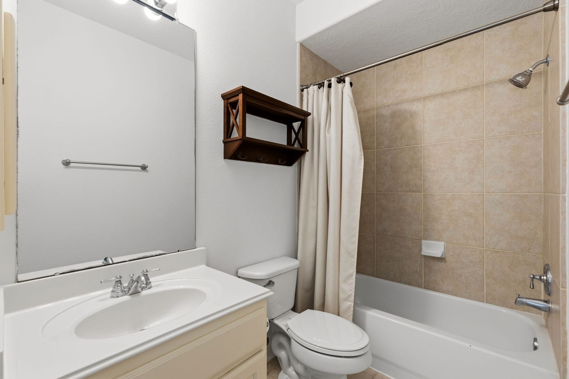 Full bathroom for the secondary bedroom downstairs.  Nice room is very private so guest will feel right at home.