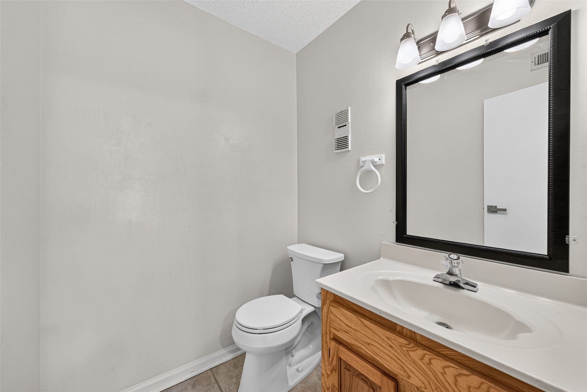 Convenient half bathroom with vanity