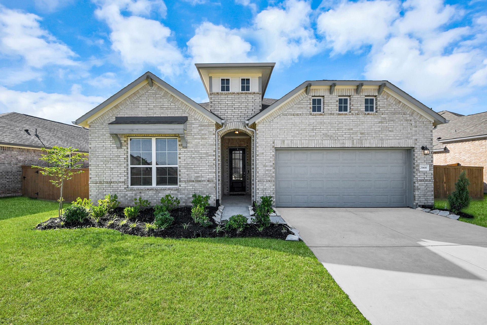 2968 Golden Dust Drive, Katy, TX 77493 The exterior features well-maintained landscaping, a manicured lawn, and a welcoming front entrance.