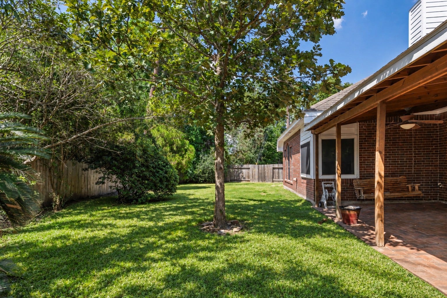 16926 Cobbler Crossing Drive, Sugar Land, TX 77498 A shady backyard, mature trees and plenty of green space make this an easy place to slow down and enjoy being outside. The covered brick patio adds a comfortable spot for relaxing or entertaining, while the fenced yard and sprinkler system help keep outdoor living simple.