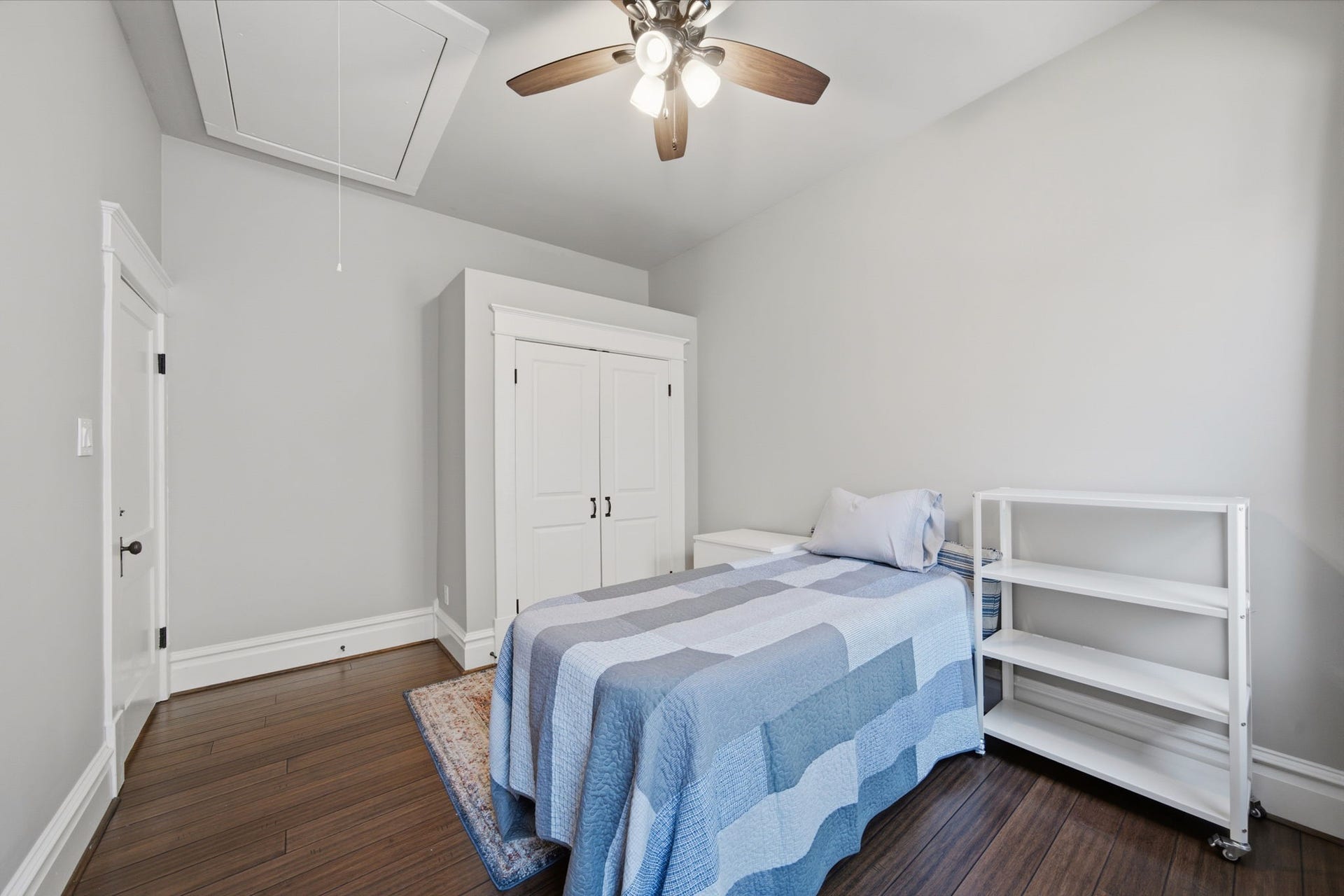 Another view of this guest bedroom (of 3). Double door closet for plenty of STORAGE! Attic access is in this room - for additional storage space!