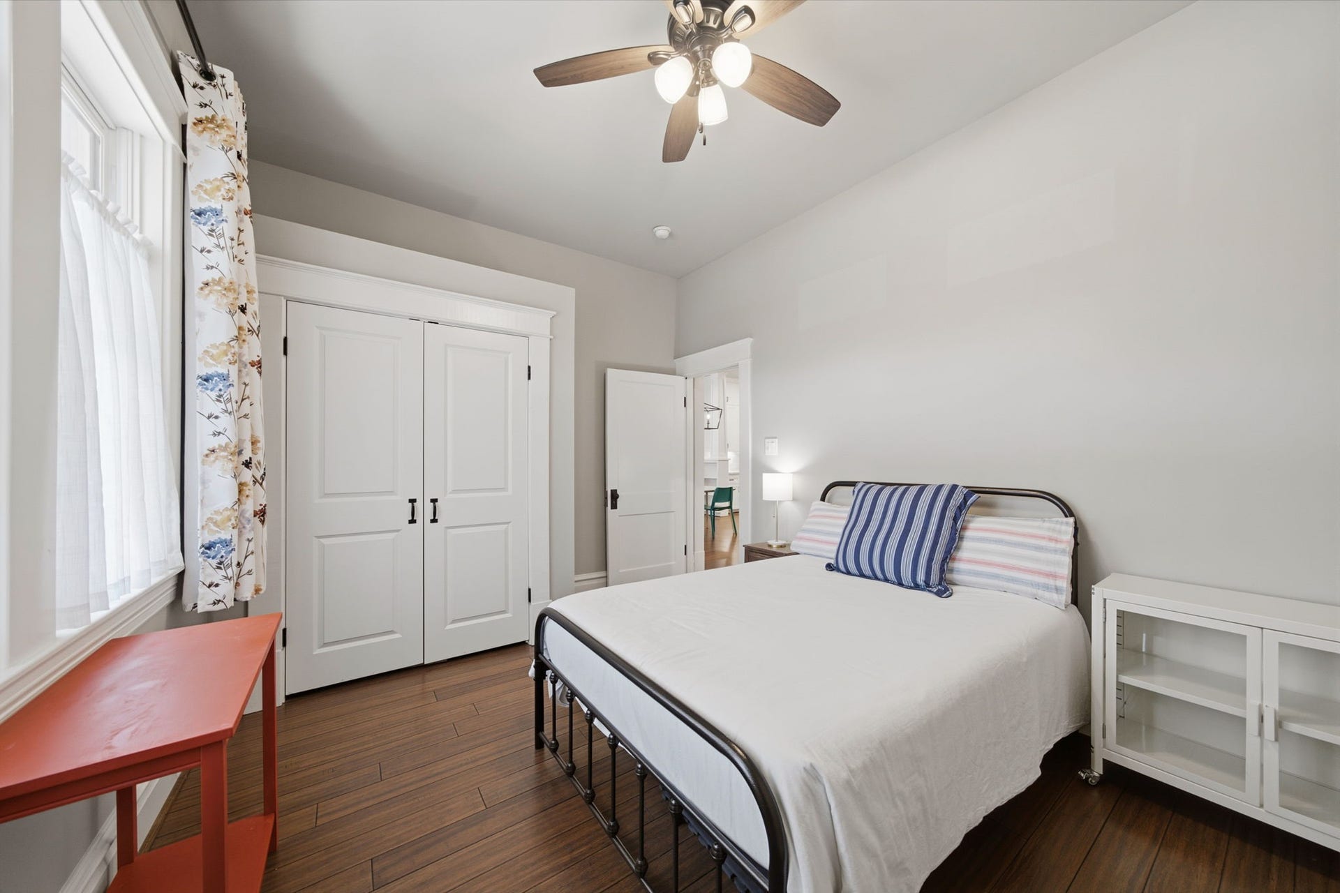 Guest bedroom (of 3) at the front of the home. Double door closet for plenty of storage!