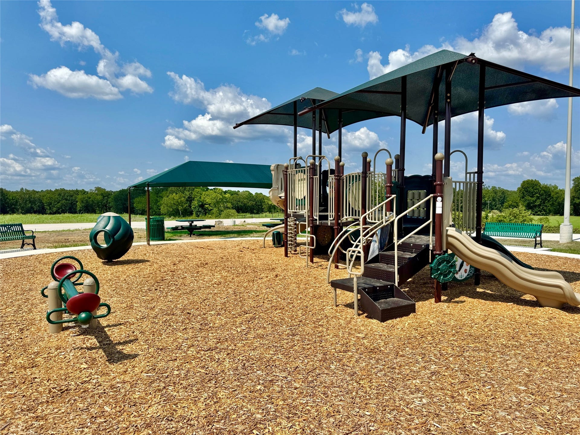347 West Rose Marie Lane, Montgomery, TX 77356 Enjoy outdoor fun and play at the community playground, which features slides, swings, and climbing equipment, plus a covered area with tables for picnics and gatherings.