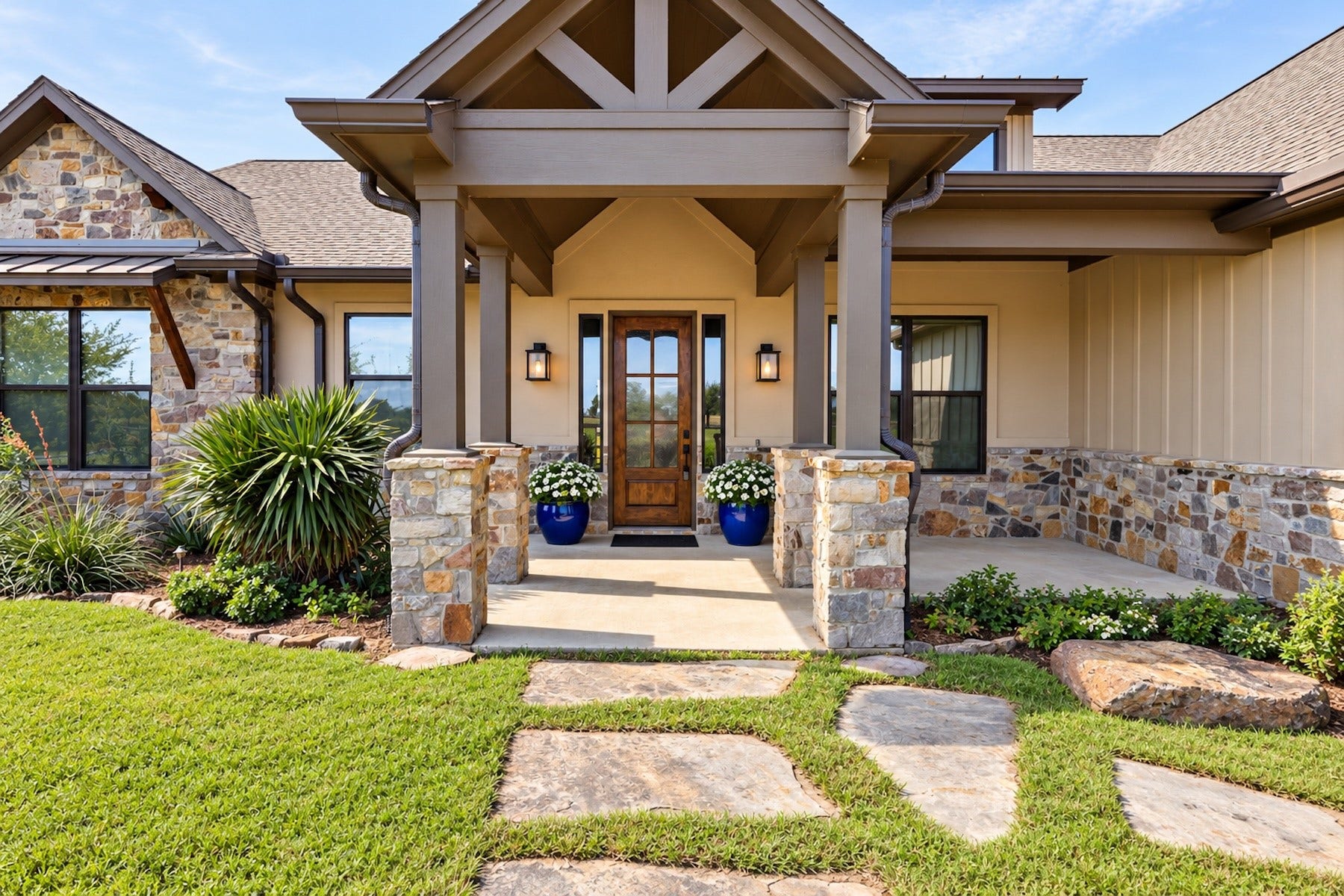 30163 High Spirit Ranch Road, Hempstead, TX 77445 Warm and inviting front porch with flagstone paved walkway. Add your favorite rocking chairs and watch the morning arrive.