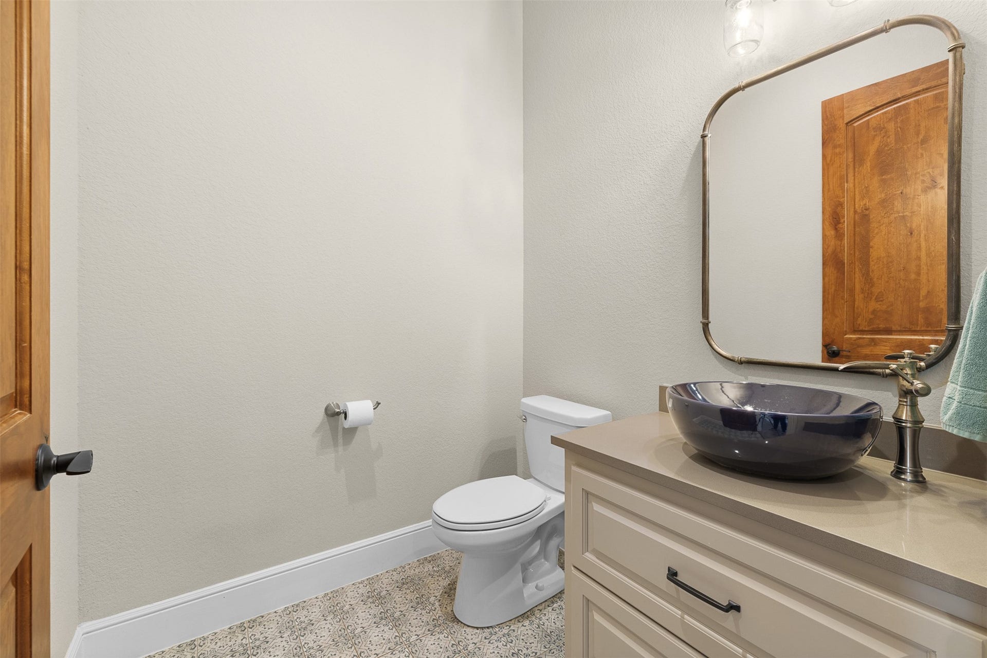 30163 High Spirit Ranch Road, Hempstead, TX 77445 Half bath offers designer features in flooring and finishes.