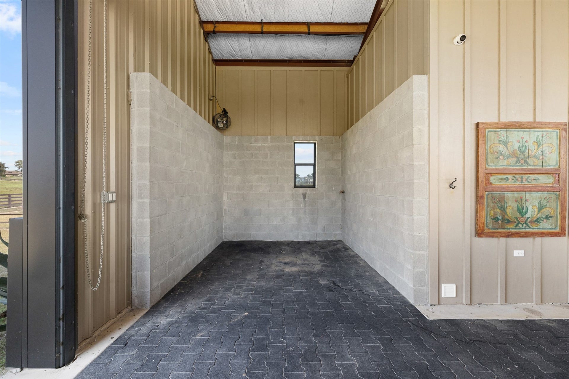 30163 High Spirit Ranch Road, Hempstead, TX 77445 The barn has a wash rack on the end with plenty of room for equipment and horses.