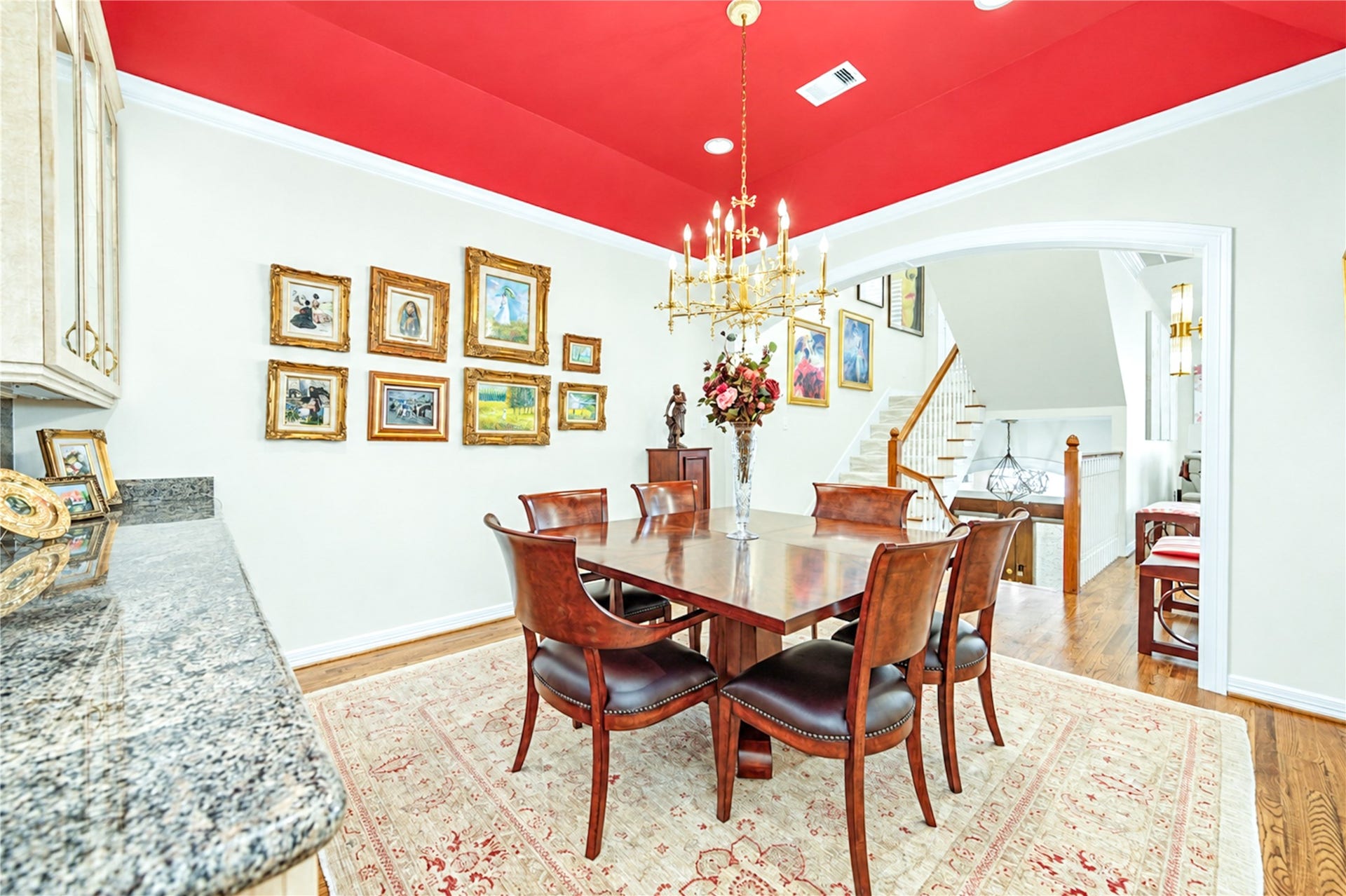 4 Milan Estates, Houston, TX 77056 The second-floor formal dining room offers crown molding, hardwood floors and custom built-in cabinetry with a granite-topped buffet.