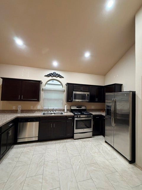 5406 Floral Valley Lane, Katy, TX 77449 Spacious Kitchen with High Ceilings & Peninsula, Side-by-Side Refrigerator conveys with the home