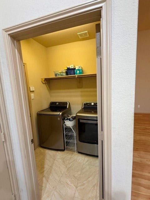 5406 Floral Valley Lane, Katy, TX 77449 Laundry Room leads to the Attached Garage - Washer & Dryer convey with the home