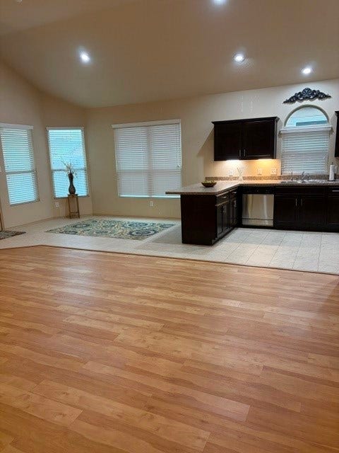 5406 Floral Valley Lane, Katy, TX 77449 Dining and Kitchen Area are well lit with windows and overhead lighting