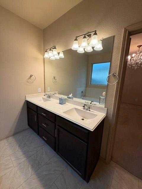5406 Floral Valley Lane, Katy, TX 77449 Primary Bath has Double Sinks, Vaulted Ceilings, Large Walk-In Closet