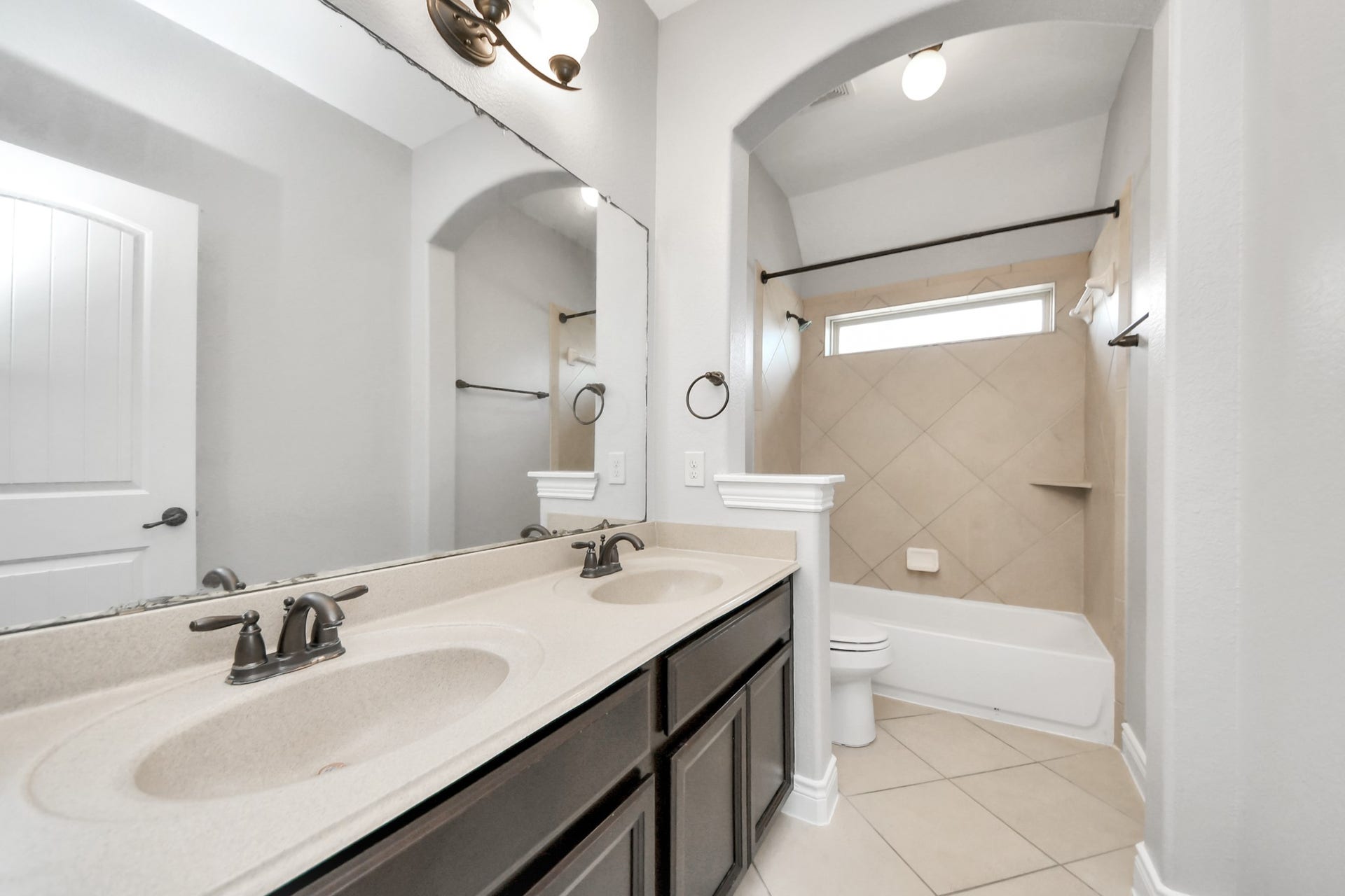 9422 Brannok Lane, Tomball, TX 77375 Full bath with dual sinks on second floor.