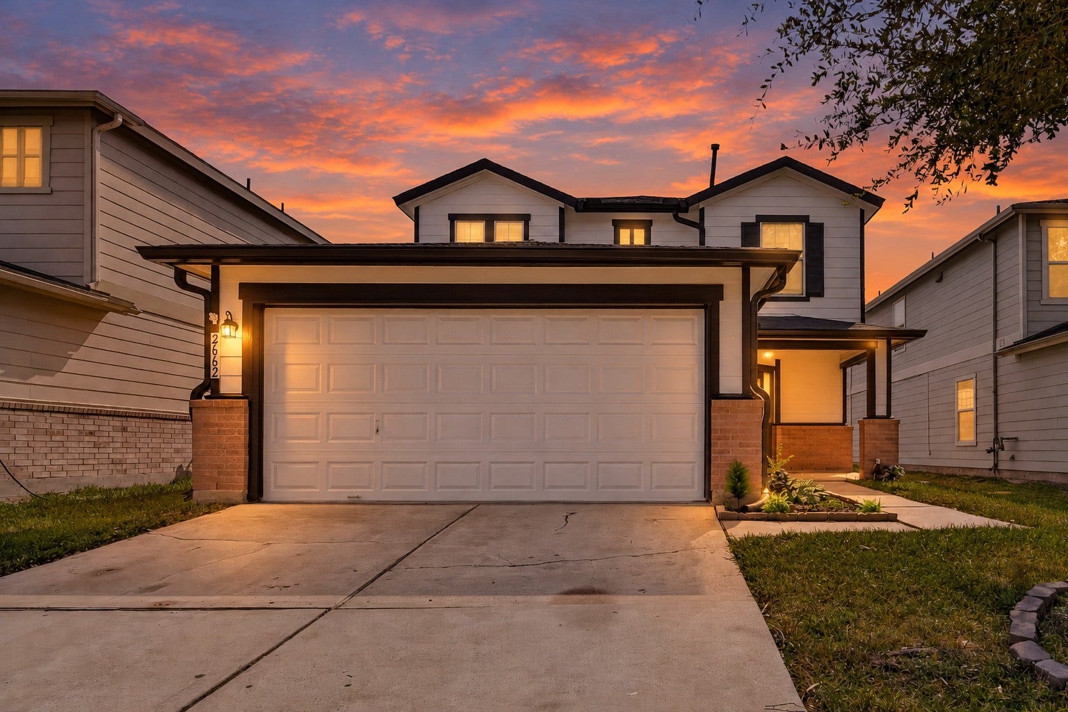 2662 Skyview Glen Court, Houston, TX 77047 A smooth, spacious driveway leads to the attached two-car garage, providing ample room for parking and a convenient approach to the home.
