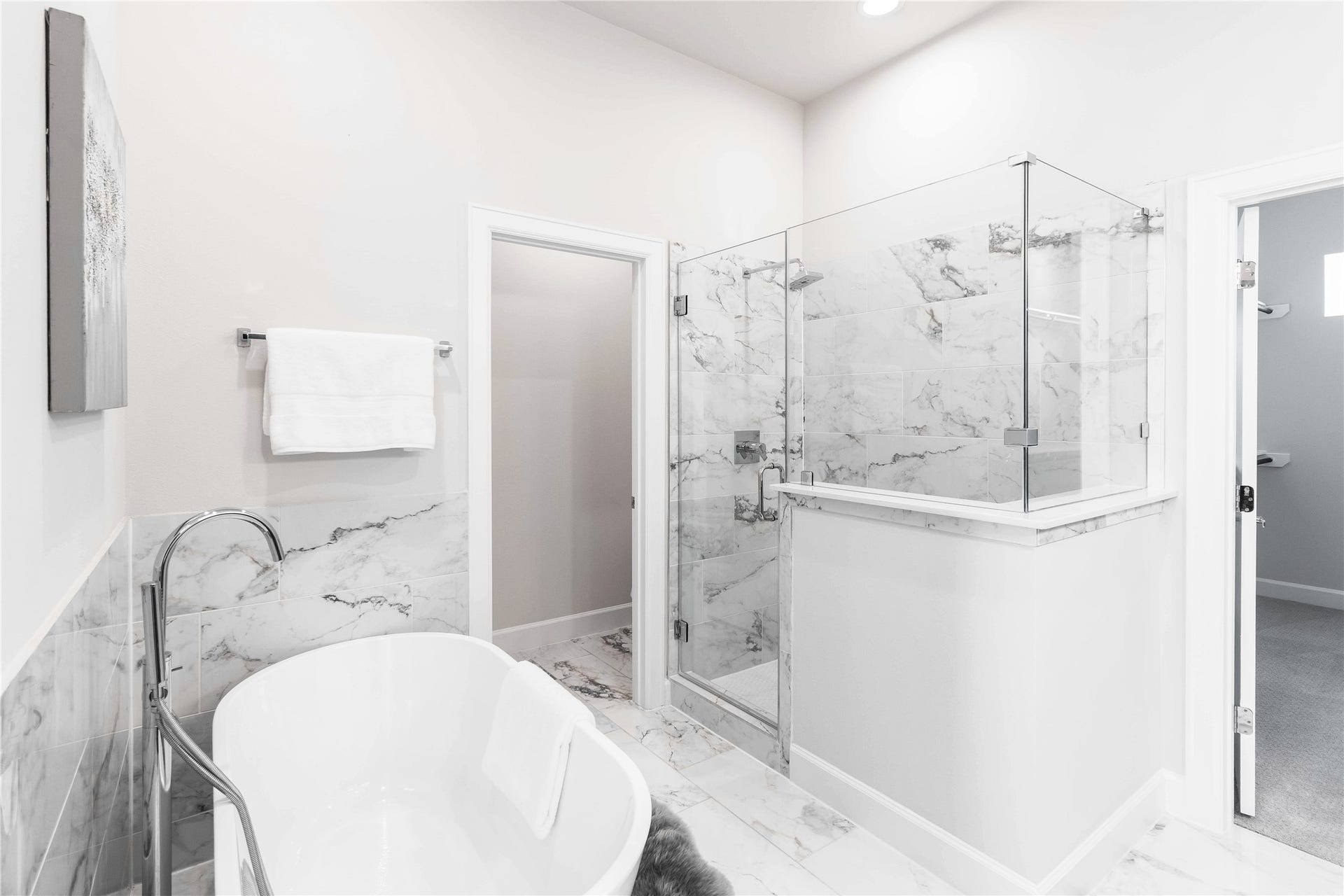 3111 La Branch Street, Houston, TX 77004 Primary bathroom with stand up shower and floating bathtub.