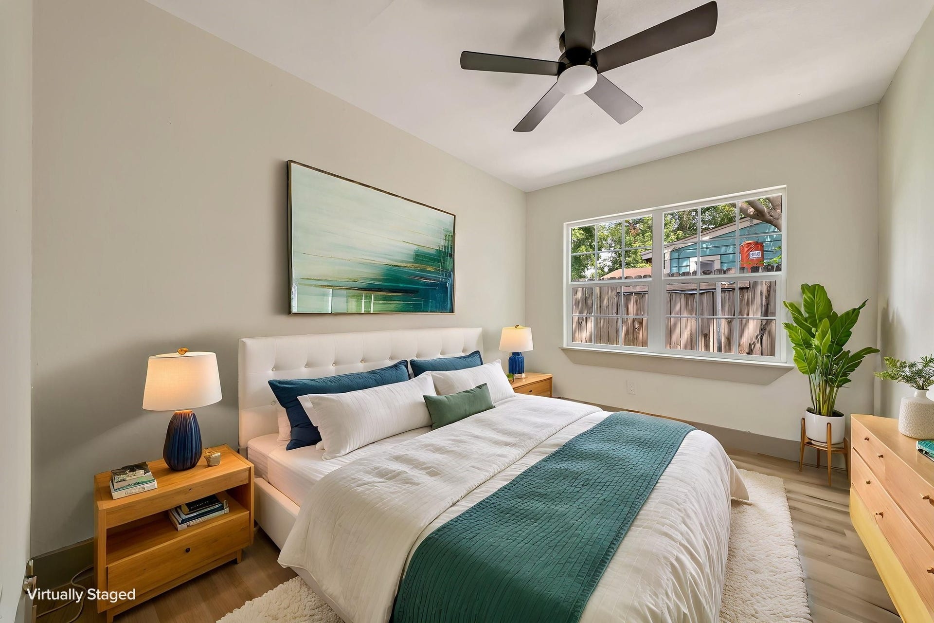 6638 Thornwall Street, Houston, TX 77092 (Photoshopped) Experience restful elegance in this virtually staged bedroom, featuring a serene color palette, abundant natural light, and stylish modern furnishings that create an inviting retreat.