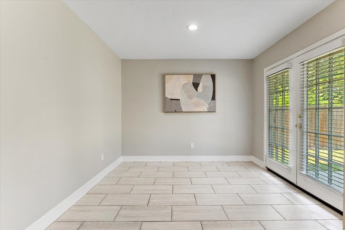 6327 Westcreek Drive, Brookside, TX 77581 Mother-in-law suite offering a flexible living and dining area, its own private entrance, and backyard access. Ideal for extended family or guests