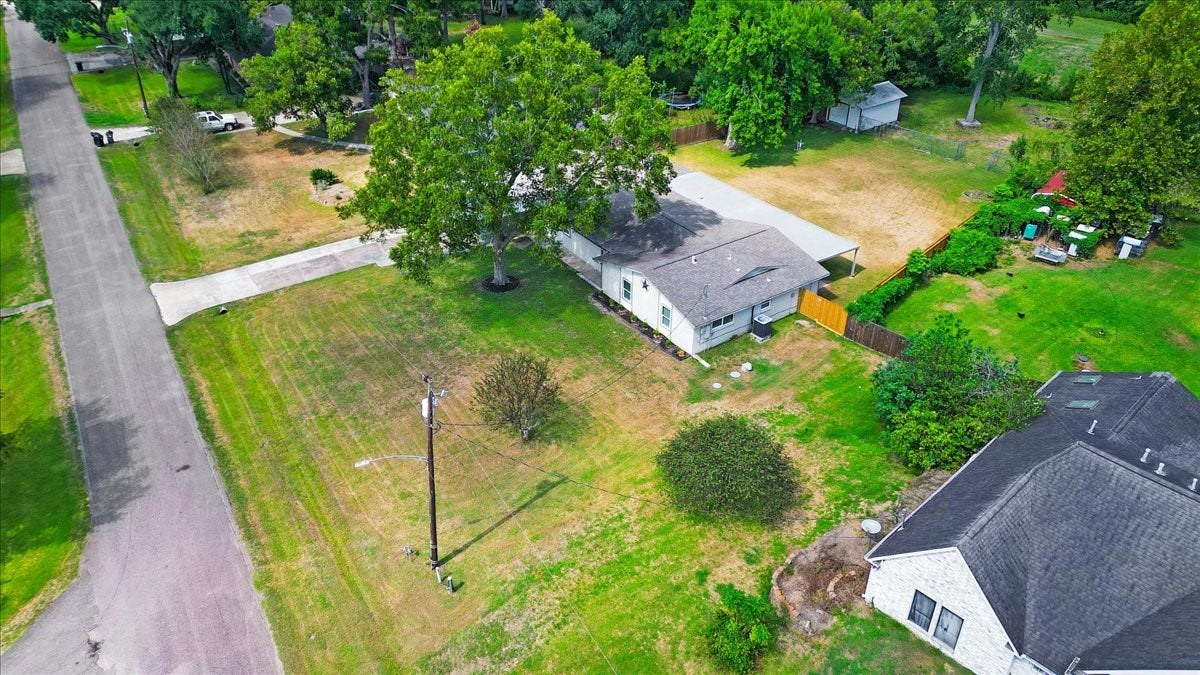 6327 Westcreek Drive, Brookside, TX 77581 Aerial view showcasing the impressive 0.642-acre lot, home layout, and spacious surroundings