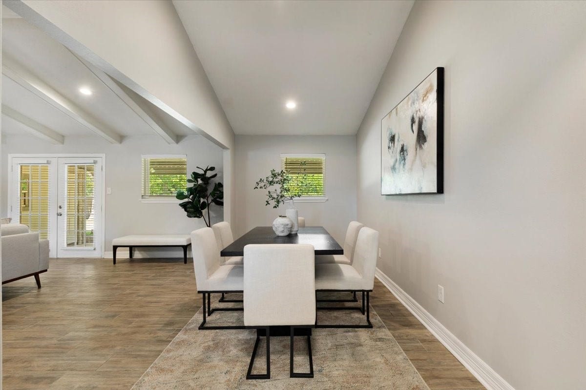 6327 Westcreek Drive, Brookside, TX 77581 Bright and spacious dining area featuring beautiful flooring, modern finishes, and an open layoutperfect for everyday meals and entertaining guests