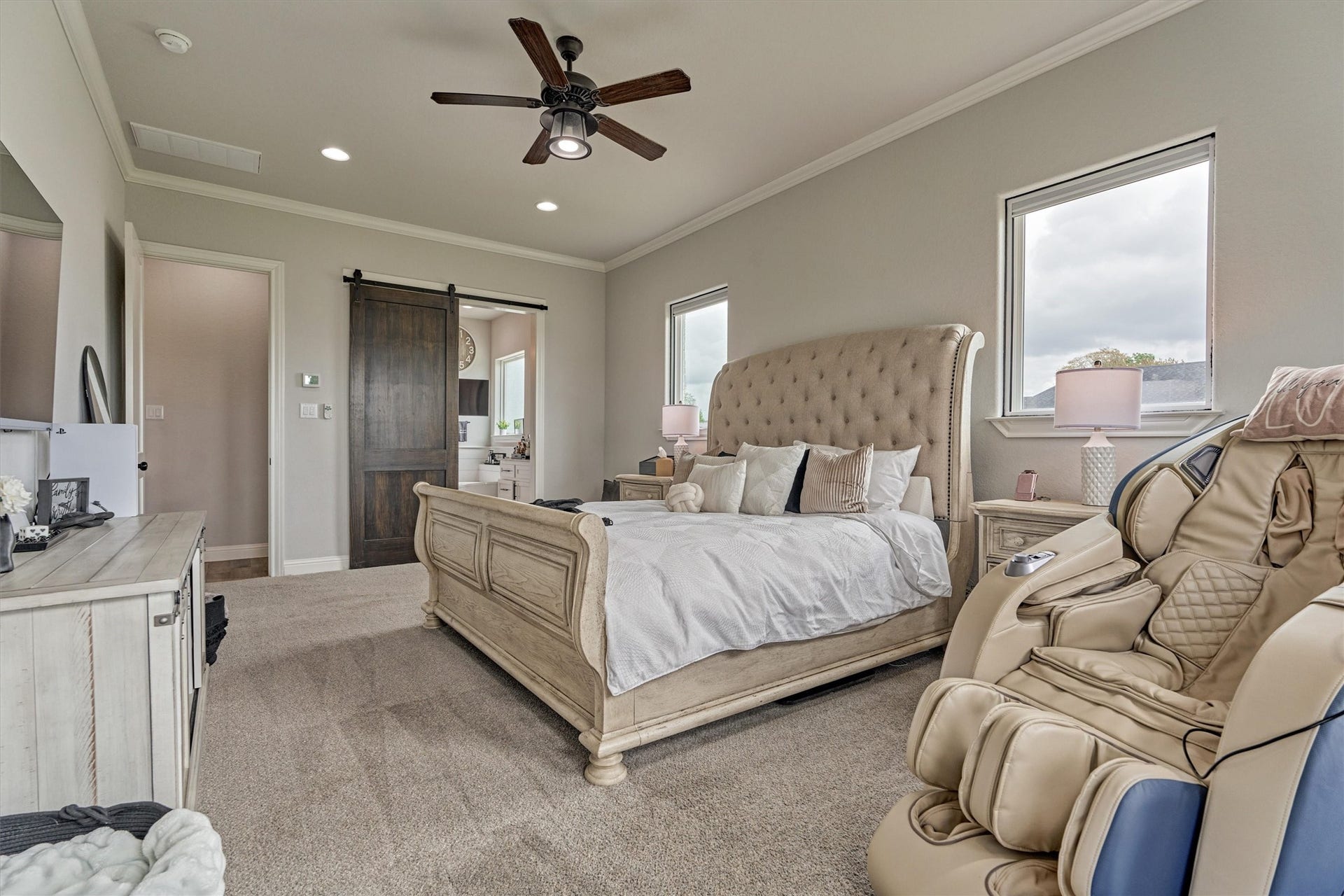 11609 Grand View Drive, Montgomery, TX 77356 Primary bedroom features high ceilings and large windows.