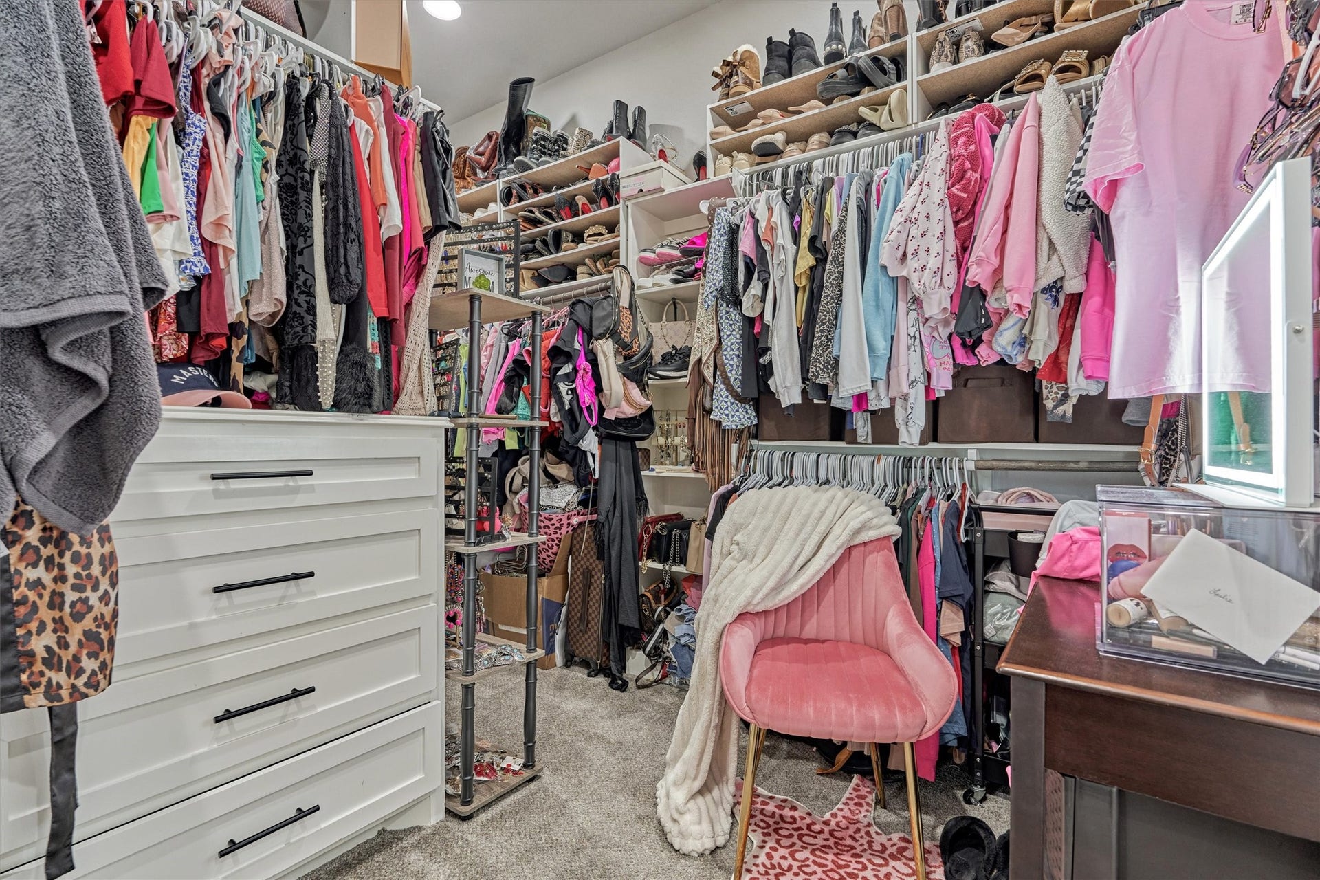 11609 Grand View Drive, Montgomery, TX 77356 Large primary closet with built in cabinetry