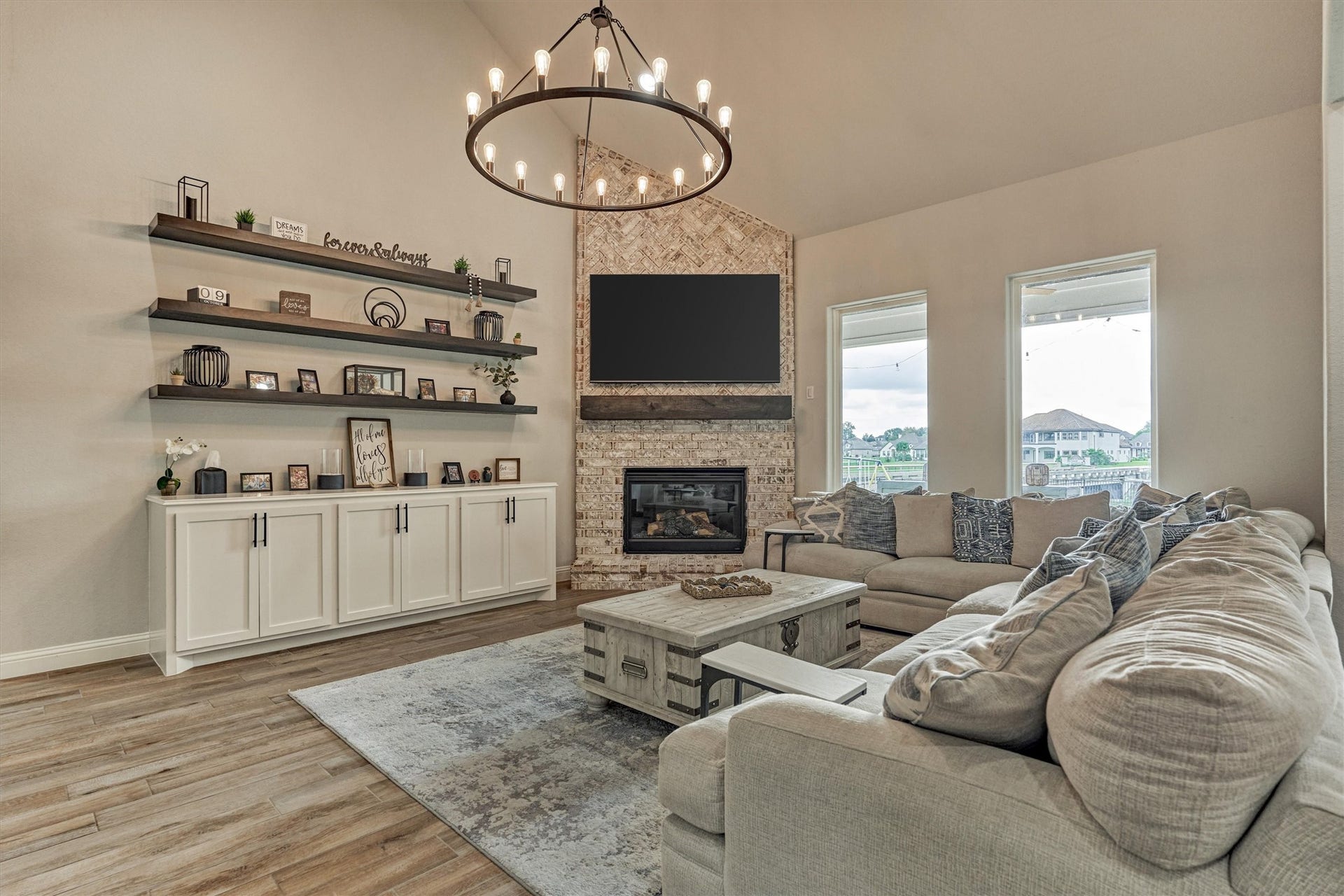 11609 Grand View Drive, Montgomery, TX 77356 Living area with custom cabinetry and shelving.