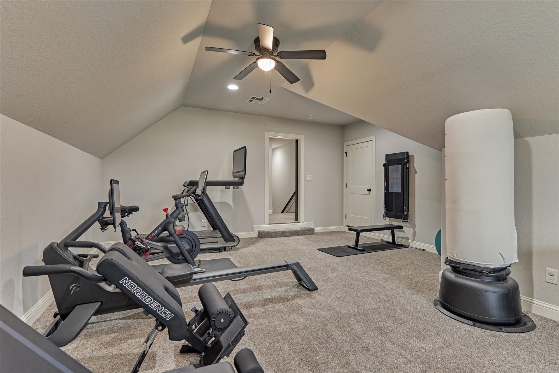 11609 Grand View Drive, Montgomery, TX 77356 The upstairs flex space features direct access to a floored in attic, perfect for extra storage.