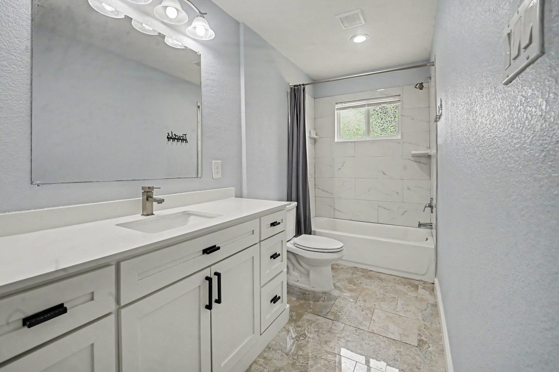 4818 27th Street, Dickinson, TX 77539 The master bathroom and the closet are updated and great size.