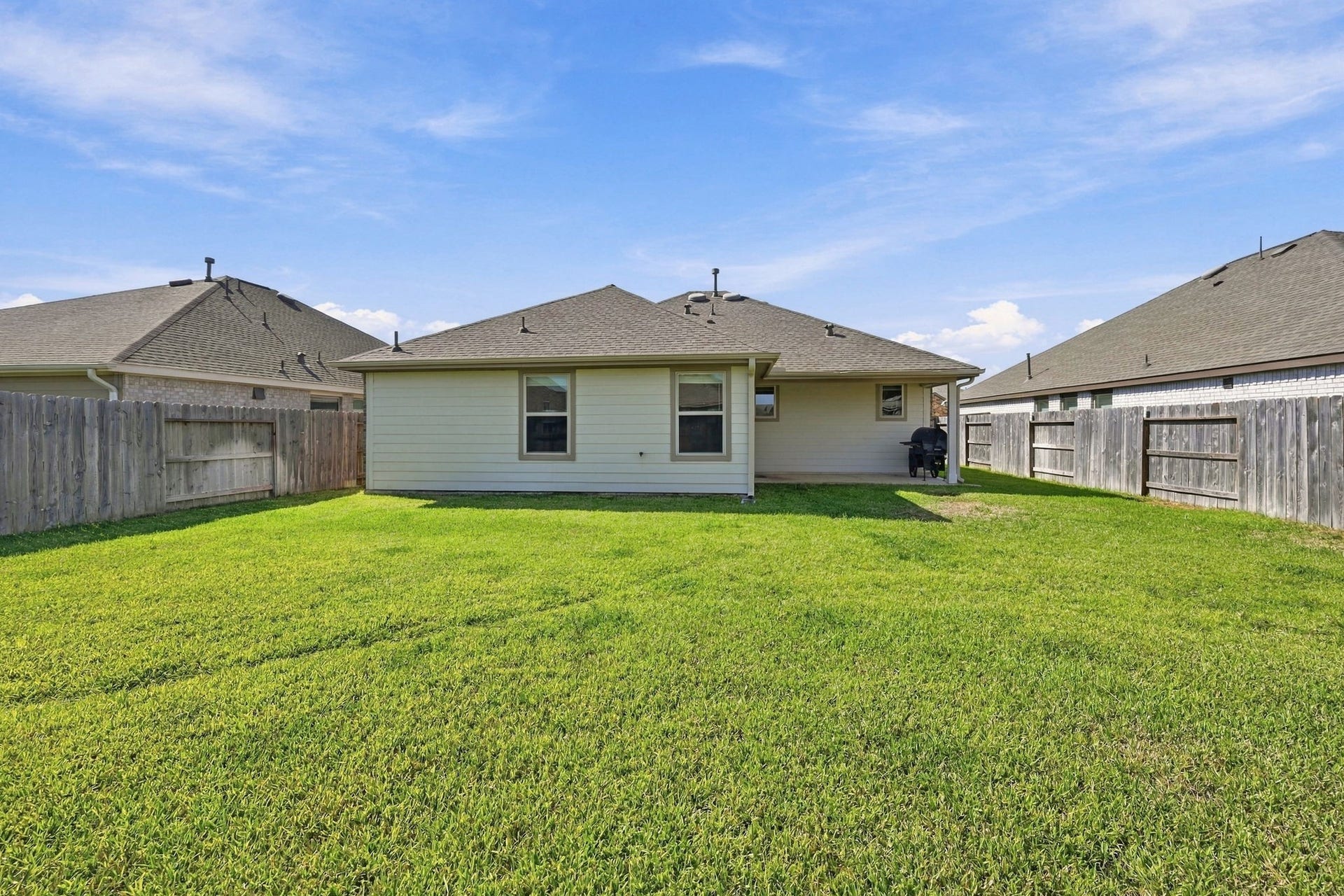 7526 Greenbriar Canyon Lane, Katy, TX 77493 This expansive backyard offers an abundance of green space, ready for a garden, shade trees, or even a future pool. Its a blank canvas just waiting for your personal touch!
