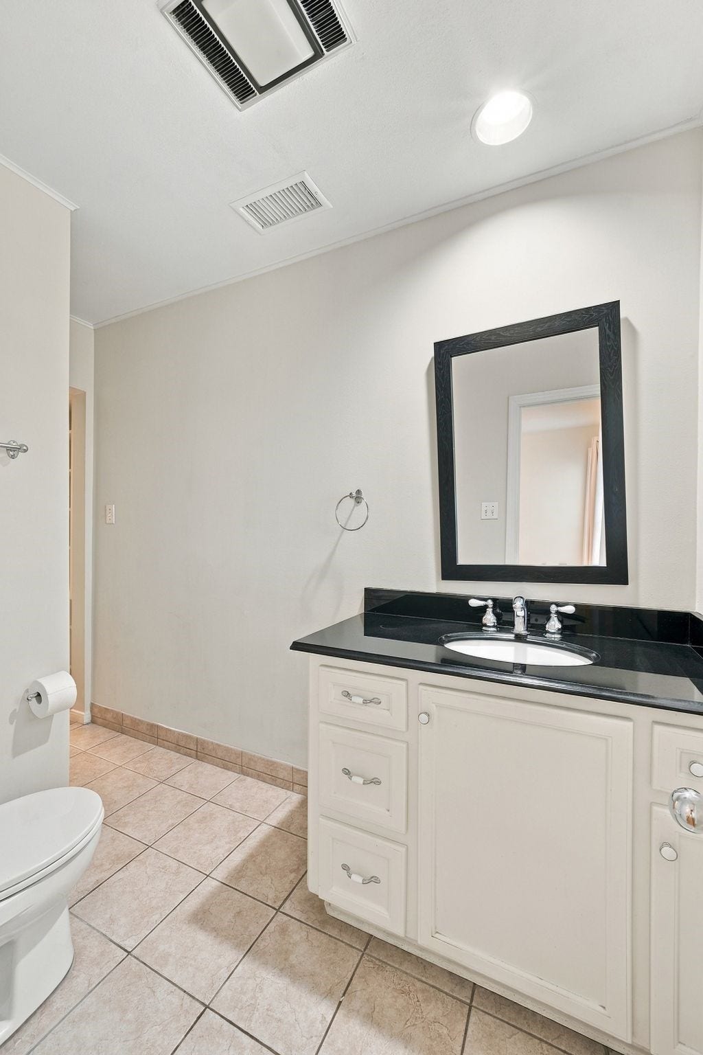 2206 Macarthur Street, Houston, TX 77030 Secondary bathroom has a shower with built in storage across from shower