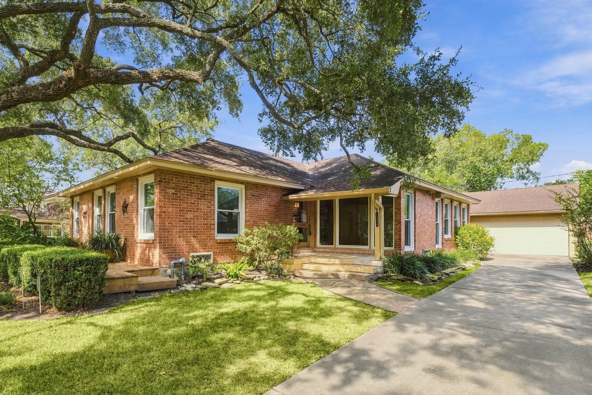 2206 Macarthur Street, Houston, TX 77030 View of driveway and two car garage