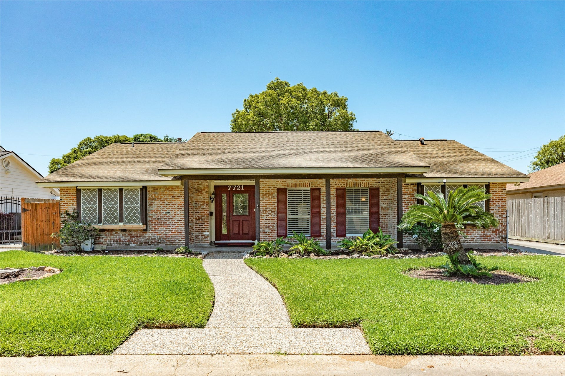 7721 Beluche Drive, Galveston, TX 77551 View of front of house from street