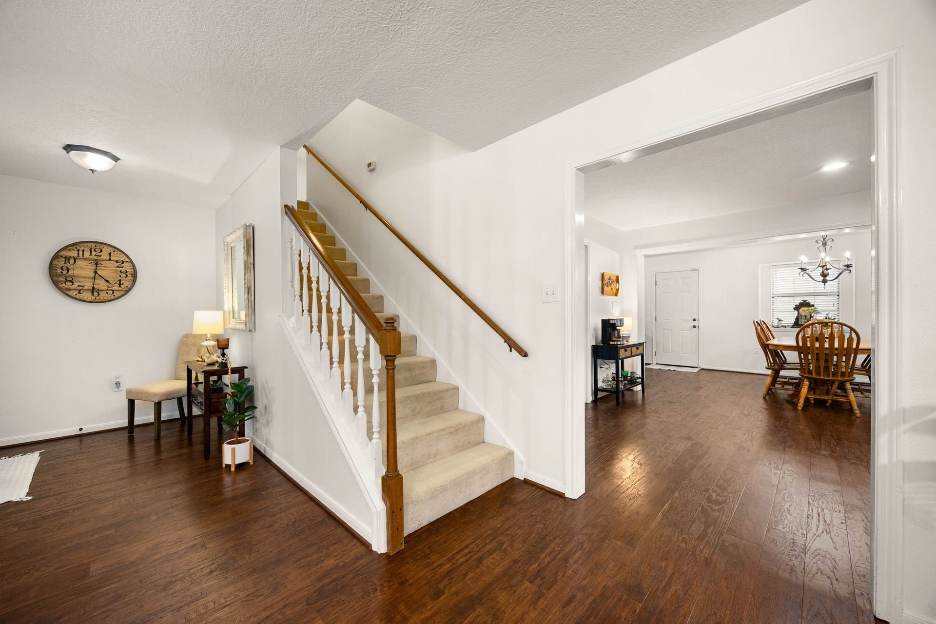 Central staircase adds character while connecting the homes first and second levels.