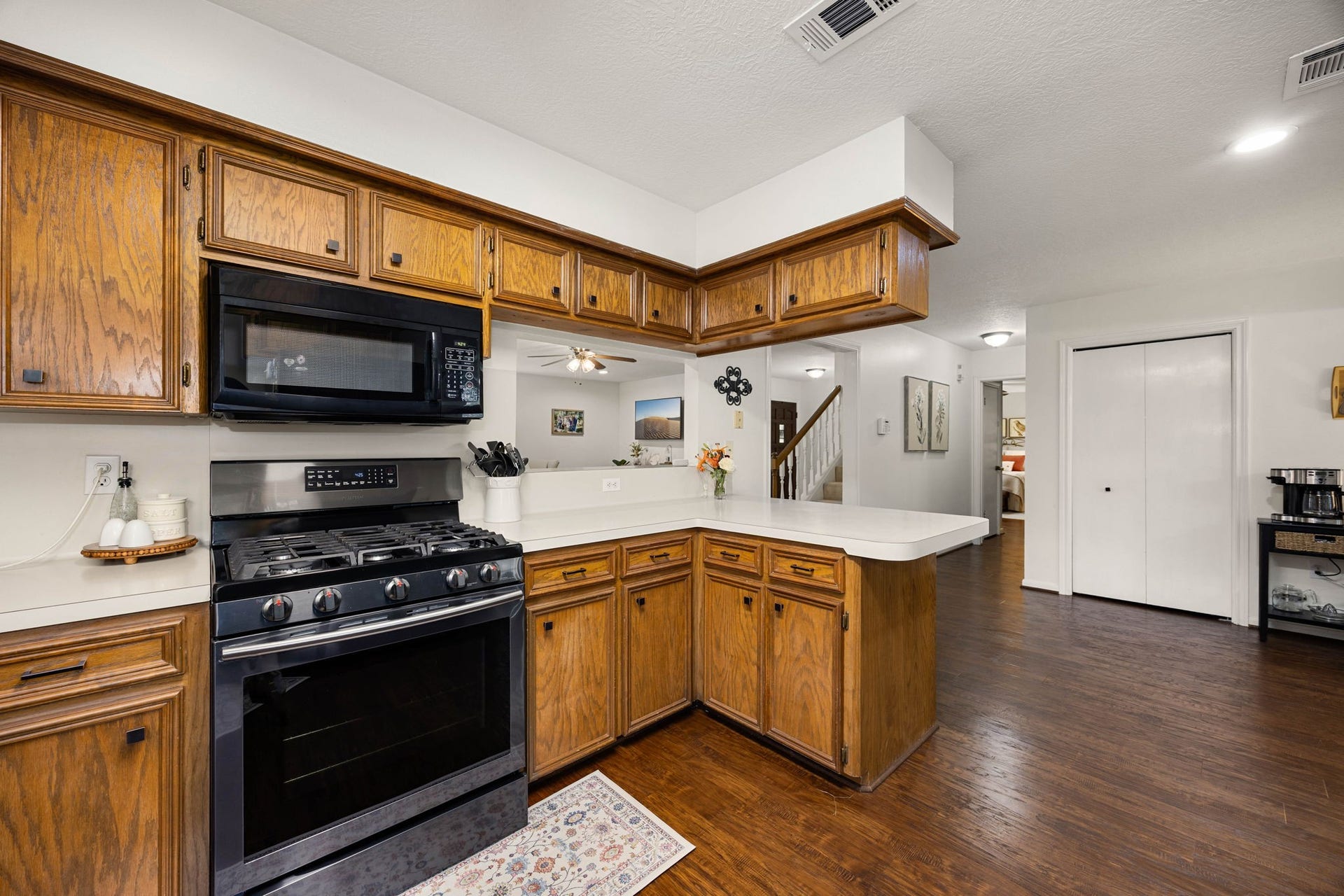 Well-appointed kitchen with electric cooking and easy access to the adjoining dining areas.