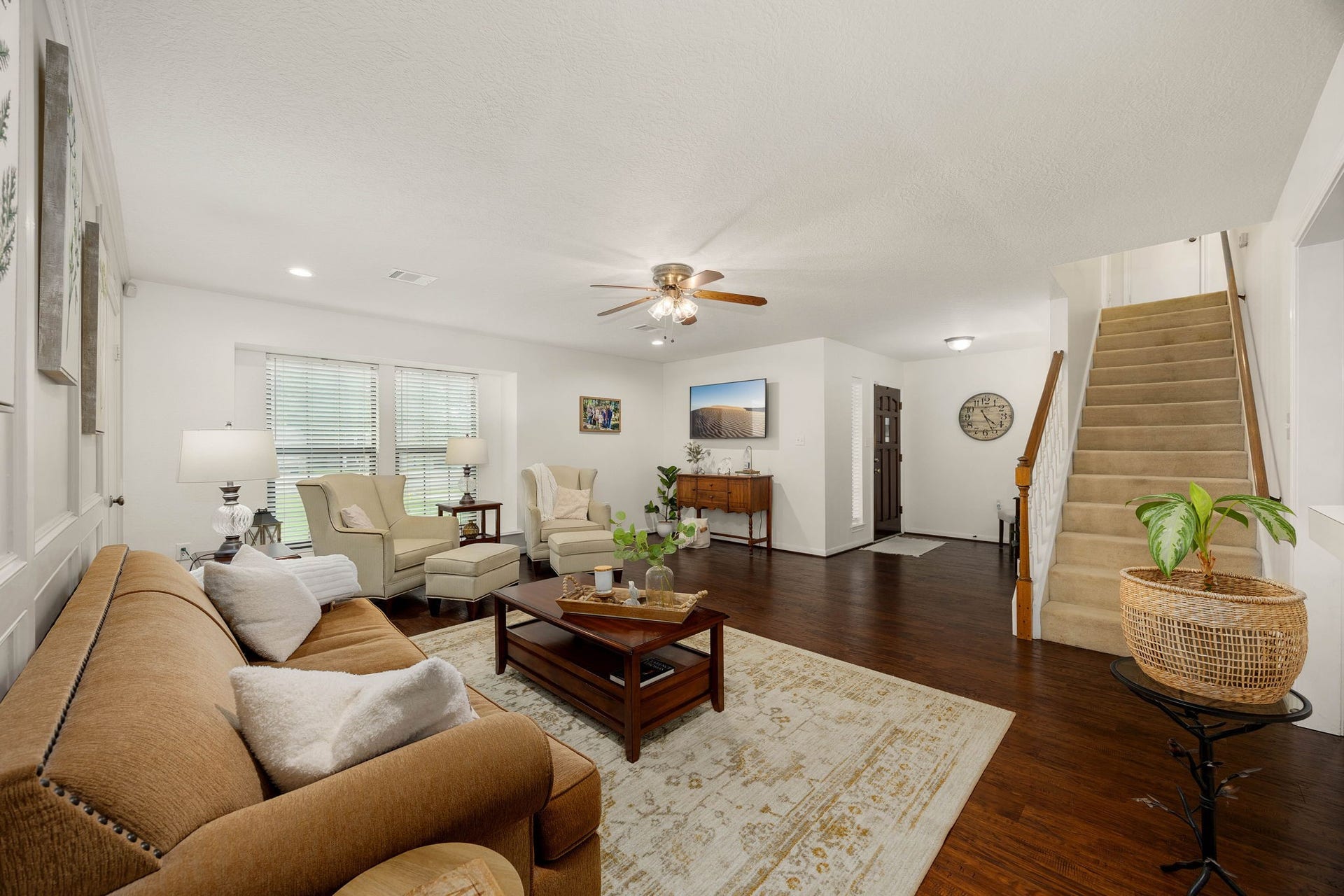 Comfortable living room offers plenty of space for multiple seating arrangements.