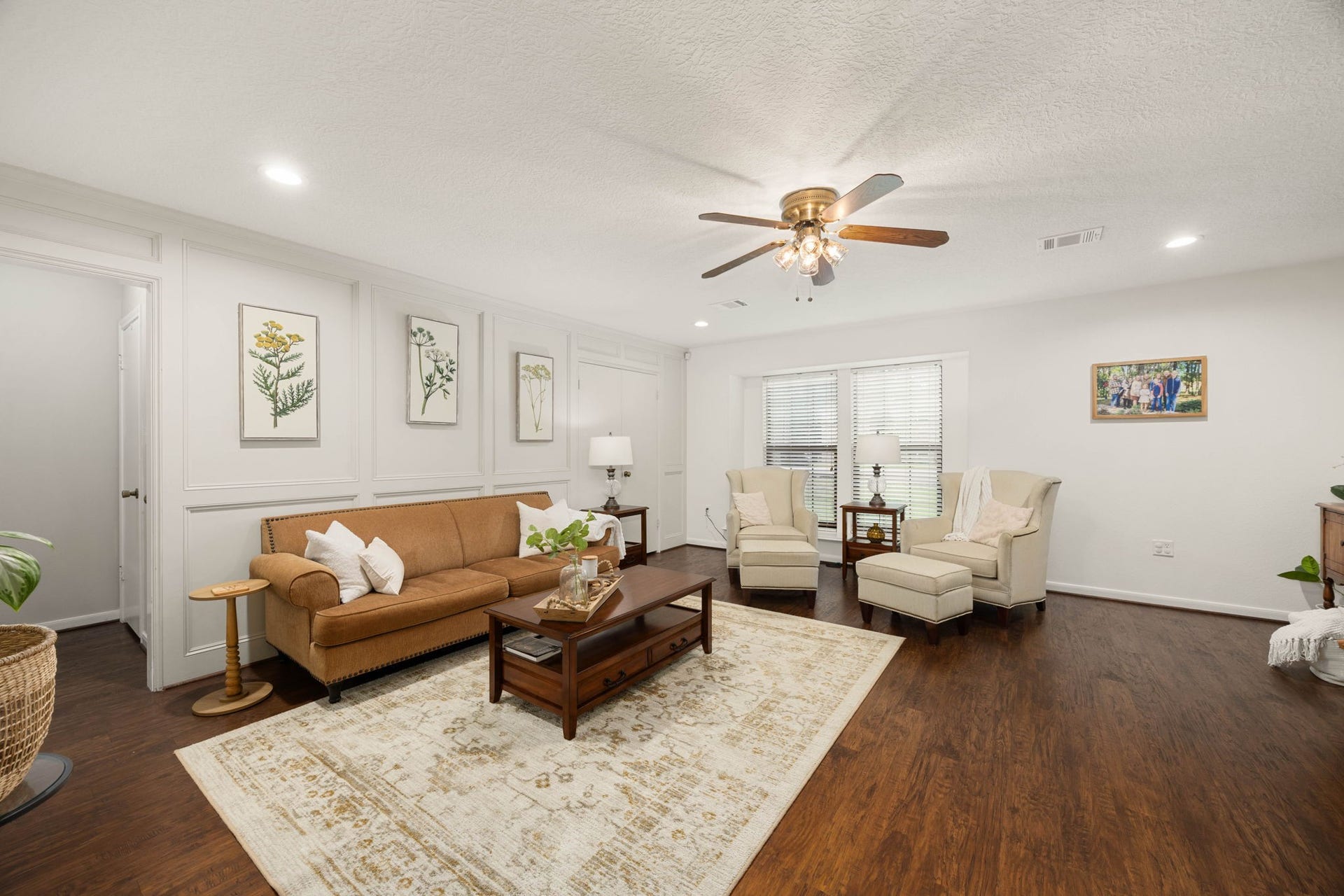 Open living space connects effortlessly with the surrounding dining and kitchen areas.