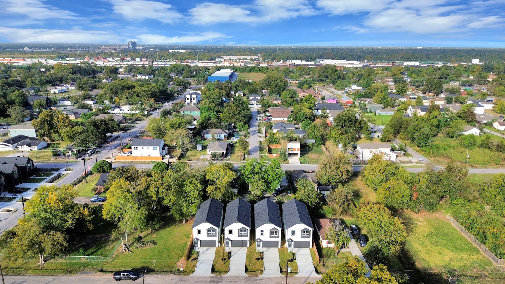6675 Nielan Street, Houston, TX 77028 Wide aerial perspective showcasing the four new construction homes along Nielan Street & their location within the established Northeast Houston neighborhood.