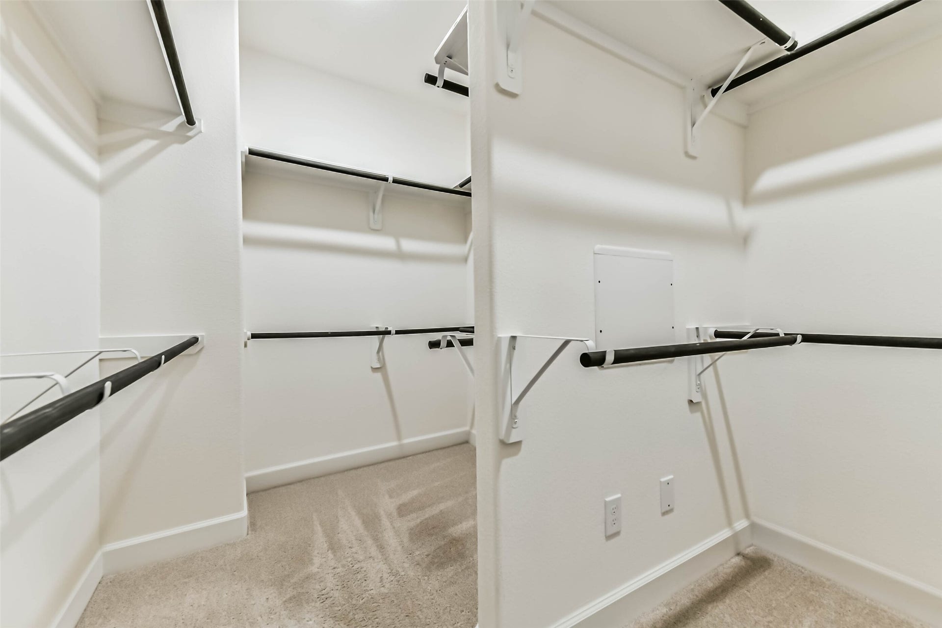 702 Campbell Drive, League City, TX 77573 Spacious walk-in closet with ample shelving and hanging space, perfect for organizing your wardrobe.