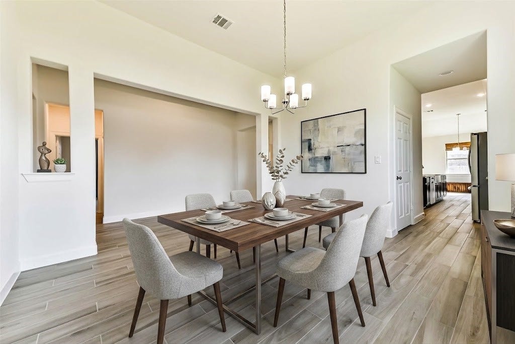 702 Campbell Drive, League City, TX 77573 Virtually staged as formal dining
