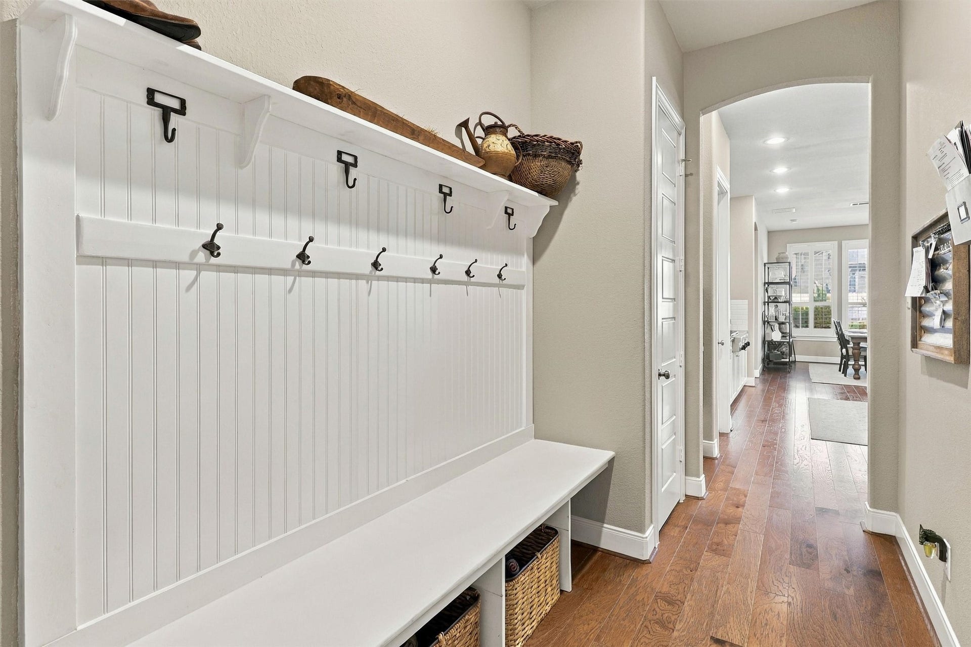 1407 Trails Of Katy Lane, Katy, TX 77494 A landing spot for the things that come home with you. The mudrooms built-in bench, hooks and lower cubbies help organize bags, shoes and daily essentials before you move into the kitchen and living spaces.